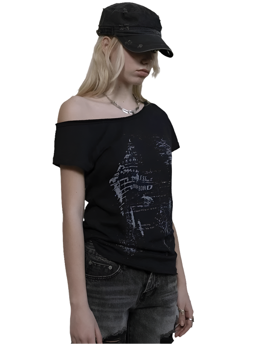 Weird0z off shoulder cyber tee in black worn with distressed jeans and a black cap