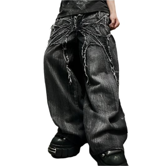 Weird0z black spider embroidered jeans with distressed web design and baggy fit