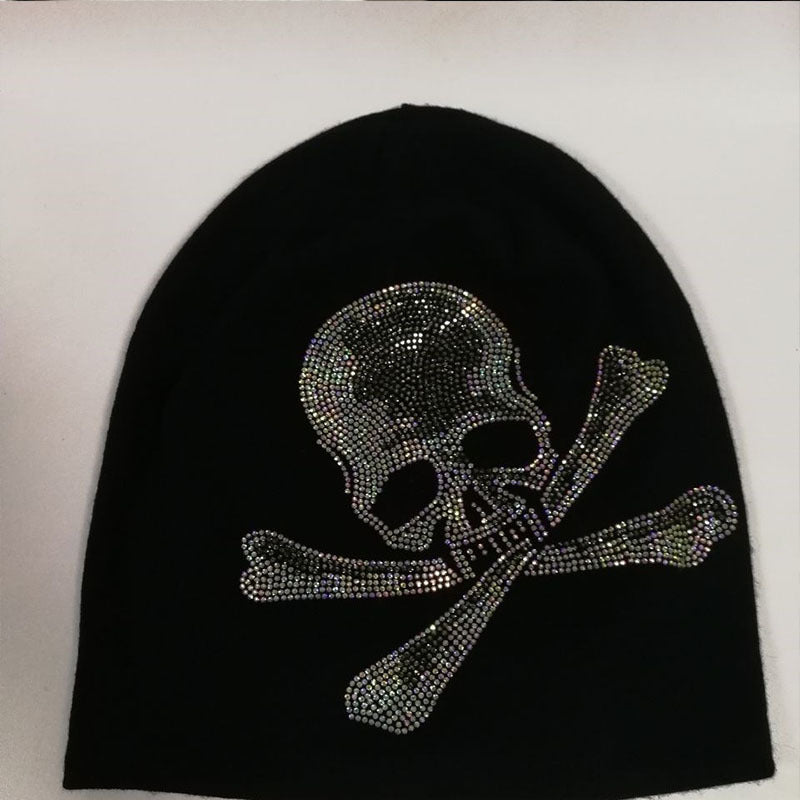 Black beanie with rhinestone skull and crossbones design from alternative fashion hats collection
