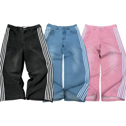 Affordable baggy streetwear pants for men and women in black blue and pink with white side stripes