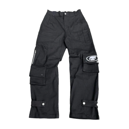 Black baggy jeans with graphic design featuring skull patch and multiple pockets