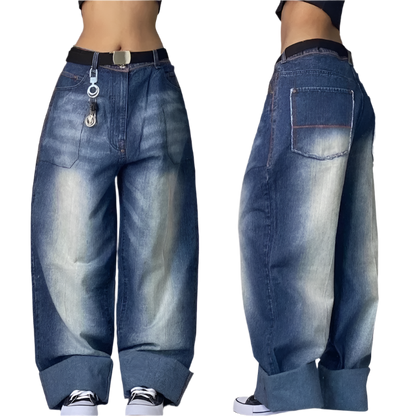 Weird0z extra baggy jeans in blue denim with faded details, wide legs, and rolled cuffs