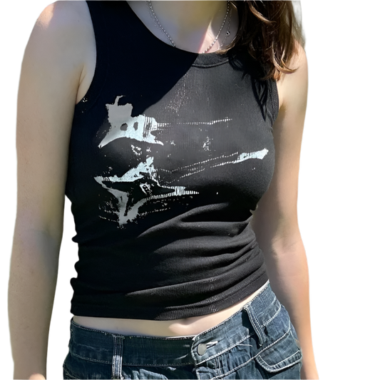 Black guitar print tank top worn by woman paired with denim jeans during sunny day