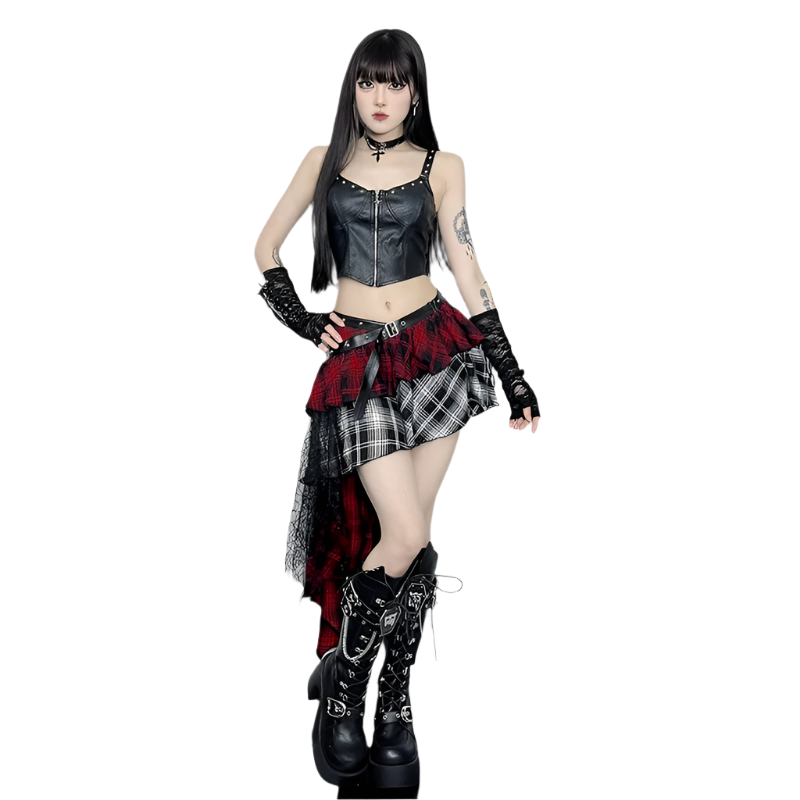 Model wearing irregular plaid skirt with red and black patterns paired with black leather top and boots