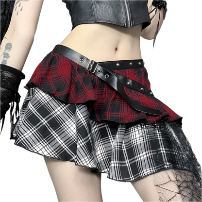 Irregular plaid skirt with layered red and black check patterns styled with a black belt from weird0z