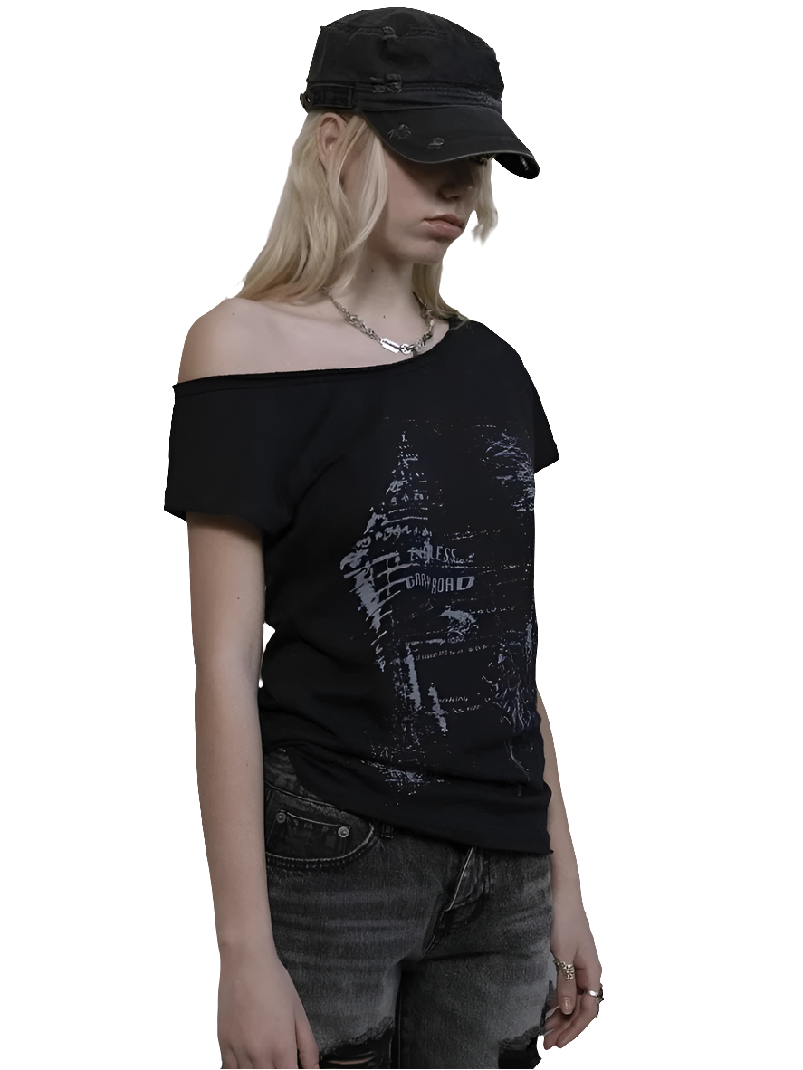 Weird0z off shoulder cyber tee in black worn with distressed jeans and a black cap