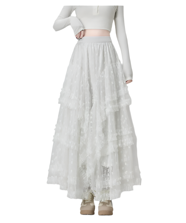 White maxi ruffled lacey skirt with floral patterns worn with white crop top and beige boots