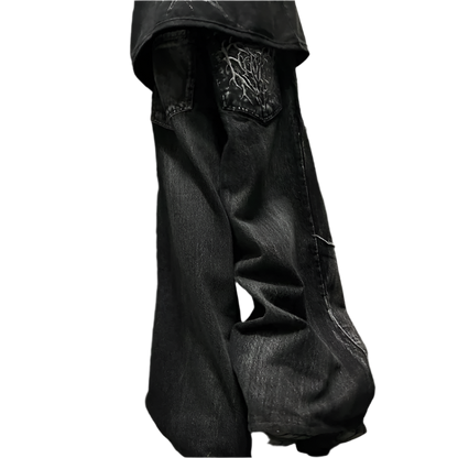 Black spider embroidered jeans with detailed spider web design on back pocket by weird0z