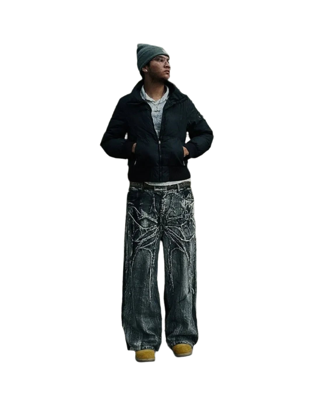 Man wearing spider embroidered jeans from weird0z with large spider design and casual winter outfit